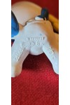 Bébé Schtroumpf avec papillon vue des inscriptions avec marque et année