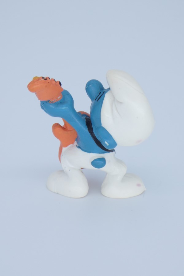 Image du Schtroumpf Guitariste vu de dos